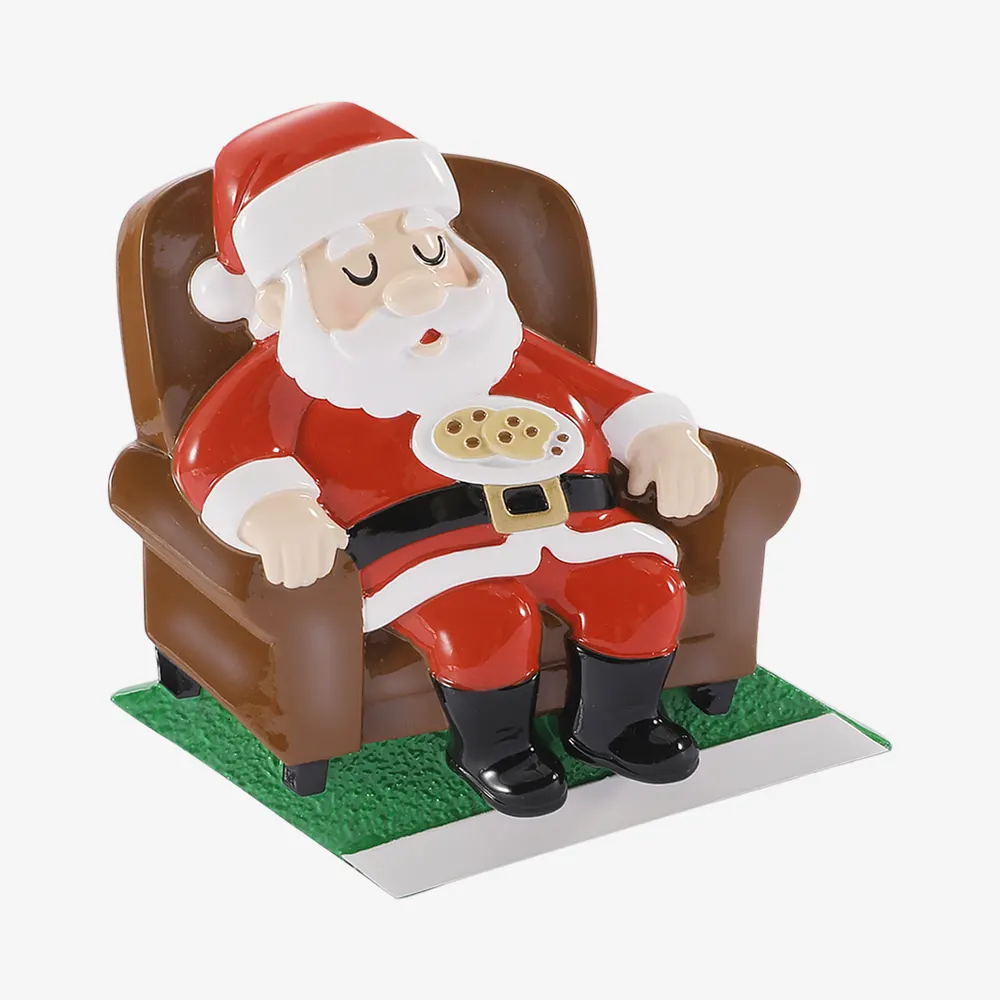 OR3154 - Sleepy Santa On A Chair With Cookies